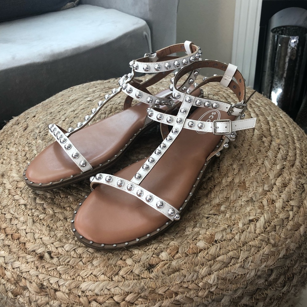 White sandals with silver studs from Scoop
